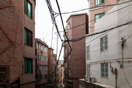 Residential buildings and cables in the old town of Seoul, South Koreaの写真素材
