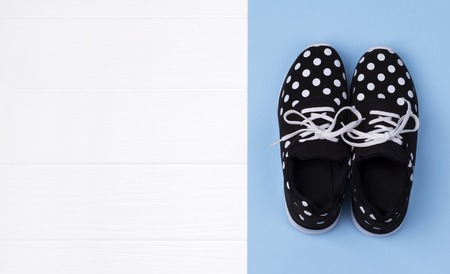 Female sneakers with copy space. Top view summer fashion, summer sale concept. Creative flat layの写真素材