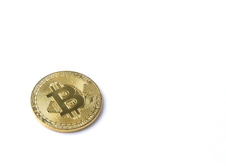 Golden bitcoin isolated on white background. The concept of virtual international currency and business on the Internet.の写真素材