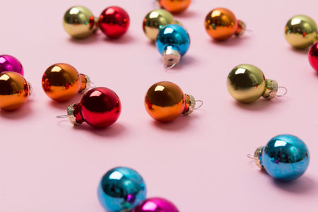 New Year Christmas top view flat lay colorful bauble with copy space on pink backgroundの写真素材