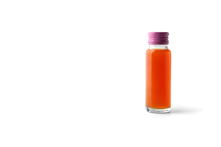 Collagen drink in glass bottle isolated on white background