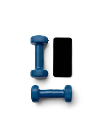 Flat lay top view blue dumbbells and smartphone isolated on white backgroundの写真素材