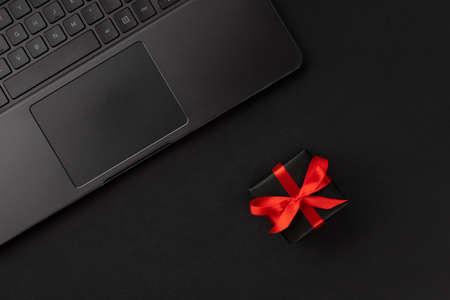 Creative flat lay top view composition laptop and giftの写真素材