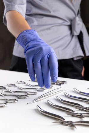 Master in the beauty salon takes the tools for the manicureの写真素材