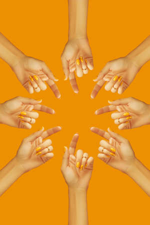 Womans hand with fashionable colorful summer nail designの写真素材