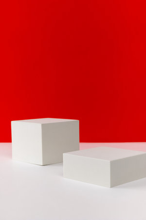 Podium on red and white creative background. Mock up template for productの写真素材