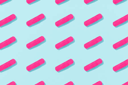 Pattern with medical patch on a blue background with deep shadows. Healthcare pharmacy and medicine conceptの写真素材