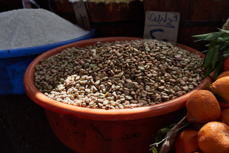 Variety organic fava beans on sale on a farmers market. Traditional arabic market