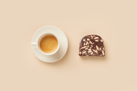 Traditional portuguese dessert Salame de Chocolate on beige background in minimal style. Restaurant bakery menuの写真素材