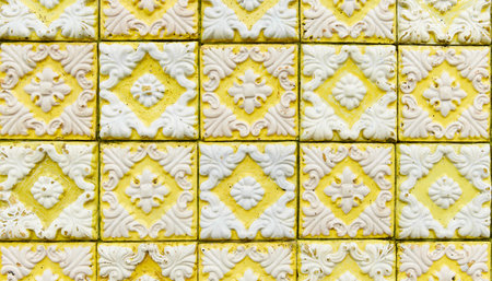 Fragment of building wall with colorful ceramic wall tiles Azulejoの写真素材