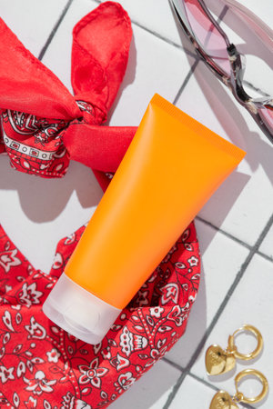 Sunscreen lotion on white background. Body care beauty treatment conceptの写真素材