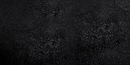 Dark gritty asphalt texture, ideal for road or tough surface visual needsの素材