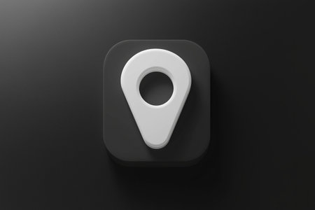 A white location pin icon placed on a sleek black square with rounded corners, conveying modern styleの素材