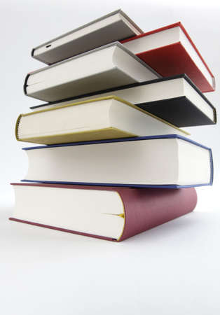 Pile of books on white background の写真素材