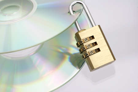 CDs with padlock - data security concept の写真素材