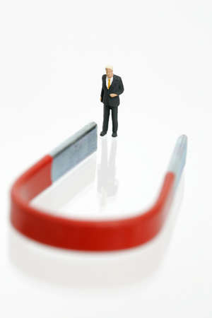 Businessman figurine with magnetの写真素材