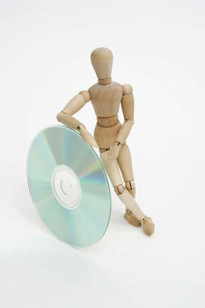 Jointed doll with cdの写真素材