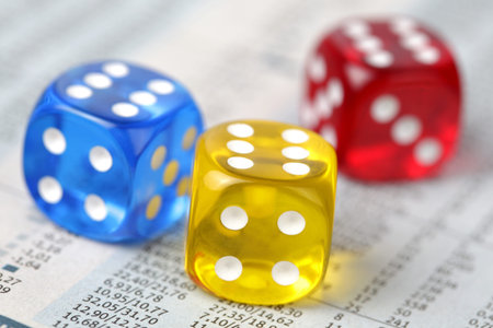 Colorful dice on financial report