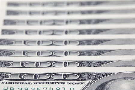 100 dollar bills on white background