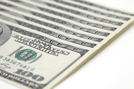 100 dollar bills on white background
