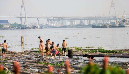 Group Of Children Running on raft togetherの写真素材