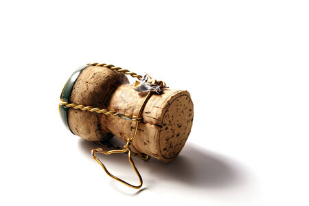 champagne cork with golden wire and green topの写真素材