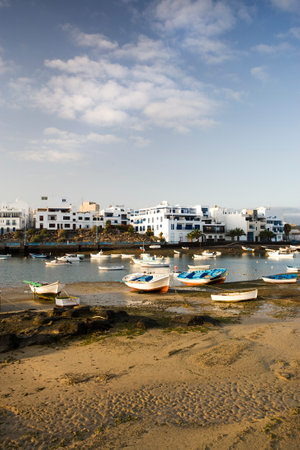 boats lying on the ground of the laguna Charco de San Gines at ebb-tideのeditorial素材