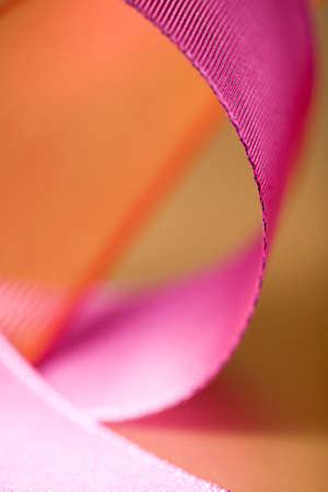 close-up of purple and orange ribbon bowの写真素材