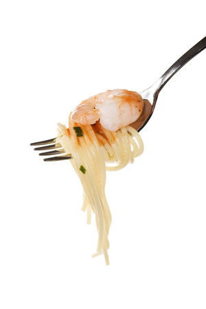 fork with spaghetti pasta and tomato sauce and shrimp on a forkの写真素材
