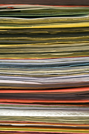 closeup of stacked file folders, suitable as backgroundの写真素材
