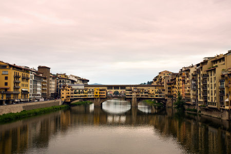 The old bridge, Ponte Vecchio, crossing the River Arno at Florence, at dawnの写真素材