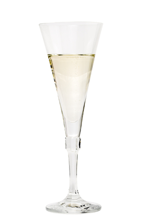 crystal glass of champagne isolated on whiteの写真素材