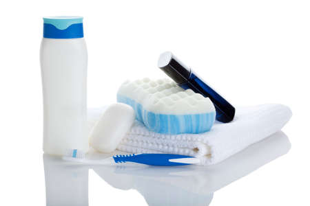 shampoo bottle, soap bar, towel, sponge, toothbrush and after shave isolated on whiteの写真素材