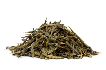 heap of green tea isolated on white backgroundの写真素材