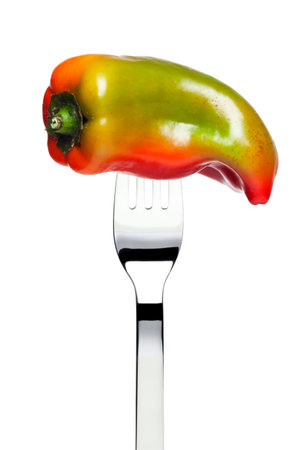 pepper on a fork isolatedの写真素材