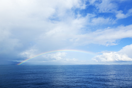 Guadeloupe, rainbow reaching from Basse-Terre to Grande-Terreの写真素材