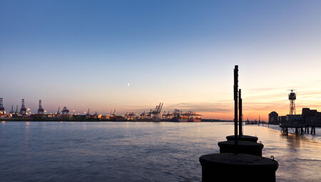 Panoramic view of Hamburg harbor on the Elbe river at sunsetの写真素材