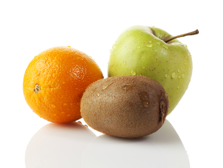 Orange, green apple and kiwi fruit isolated on white backgroundの写真素材