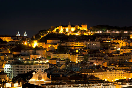 Night shot of Lisbon with Sao Jorge castle on top of the hillのeditorial素材