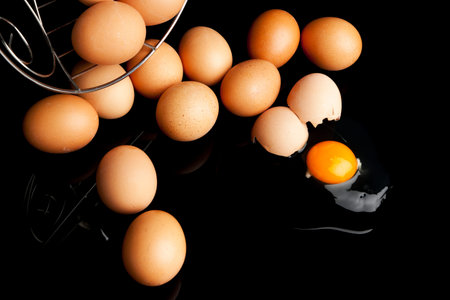 eggs falling from basket, one broken