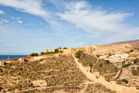 The moorish fortress Alcazaba at Almeria, with  the colorful La Chanca neighborhood in backgroundのeditorial素材