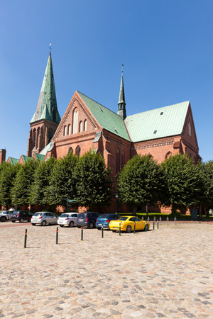 St. John church at the central square of Meldorf. Though it is a protestant church, the 13th century brick-gothic building is oft referred by by to as Meldorfer Domのeditorial素材