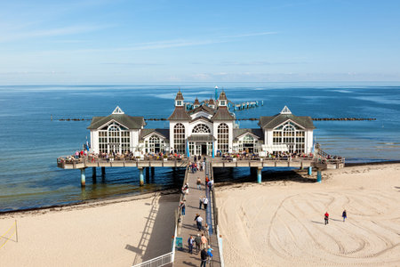 Sellin, Germany - September 22, 2016: Tourists visiting the historic pier at the Baltic Sea beach on...