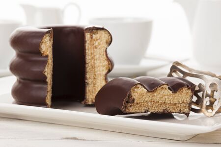 German layer cake or Baumkuchen on coffeetableの写真素材