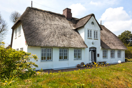 Typical Frisian thatched house with the local museum of Sylt at Keitum villageのeditorial素材