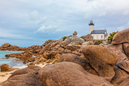 Phare de Pontusval, small lighthouse in the rocks on the beach at Brignogan-Plage, Brittanyの写真素材