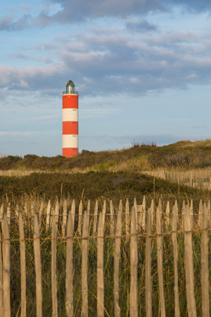 Lighthouse behind the dunes of Berck-Plage, Pas-de-Calais, Franceのeditorial素材
