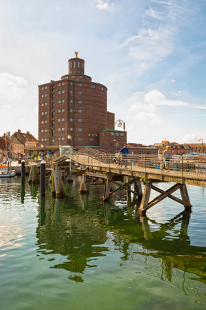 Eckernförde, Germany - July 18, 2019: The historic warehouse known as Rundsilo and the wooden drawbridge at the harbor of Eckernfoerde on the Baltic Sea coastのeditorial素材
