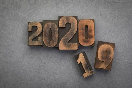 New year 2020 concept with vintage letterpress printing blocks. Number 19 replaced with number 20の写真素材