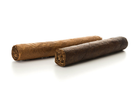 Strong and mild cigars isolated on white background